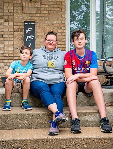 NIC ADAM / FREE PRESS
Melissa Walker (centre), a mother of four from Birds Hill, is pictured alongside her sons Ethan, 8, and David, 14, Fillion outside their house Thursday.
240815 - Thursday, August 15, 2024.

Reporter: Maggie?
