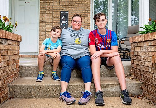 NIC ADAM / FREE PRESS
Melissa Walker (centre), a mother of four from Birds Hill, is pictured alongside her sons Ethan, 8, and David, 14, Fillion outside their house Thursday.
240815 - Thursday, August 15, 2024.

Reporter: Maggie?
