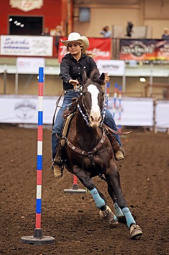 15082024
Sadie Brown of Virden competes in the pole bending event on day one of the Virden Indoor High School Rodeo at Tundra Oil and Gas Place in Virden on Thursday as part of the Virden Indoor Rodeo and Wild West Daze. Events continue all weekend in Virden including the first go round of the Virden Indoor Rodeo tonight. 
(Tim Smith/The Brandon Sun)