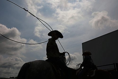 15082024
Lane Nykoliation of Hamiota warms up his rope atop his quarter-horse Drifter before competing in the team roping event on day one of the Virden Indoor High School Rodeo at Tundra Oil and Gas Place in Virden on Thursday as part of the Virden Indoor Rodeo and Wild West Daze. Nykoliation also competed in the calf roping event. (Tim Smith/The Brandon Sun)