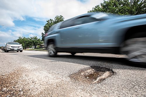 MIKAELA MACKENZIE / WINNIPEG FREE PRESS
	
A pothole at River Road and Riel Avenue on Friday, Aug. 16, 2024. 

For Joyanne story.
Winnipeg Free Press 2024