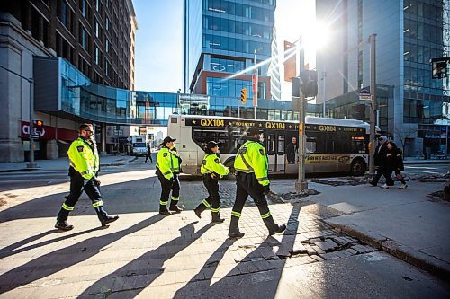 MIKAELA MACKENZIE / FREE PRESS

Transit safety officers walk down Graham Avenue on their first day on the job on Tuesday, Feb. 20, 2024. 

For Chris story.
