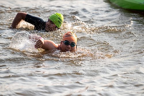 BROOK JONES / FREE PRESS
Fifteen-year-old Phoenix Abraham (right) and 17-year-old Brad Courchene (left), who are both from Sagkeeng First Nation, compete in the swim portion of the Free Spirit Sprint Triathlon in Pinawa, Man., Sunday, Aug. 11, 2024.