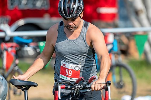 BROOK JONES / FREE PRESS
Jonathan Courchene, who is a First Nations triathlete, is pictured in the transition zone during the Free Spirit Sprint Triathlon in Pinawa, Man., Sunday, Aug. 11, 2024.