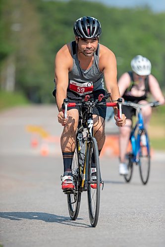 BROOK JONES / FREE PRESS
Jonathan Courchene, who is a First Nations triathlete, competes in the bike portion of the Free Spirit Sprint Triathlon in Pinawa, Man., Sunday, Aug. 11, 2024.