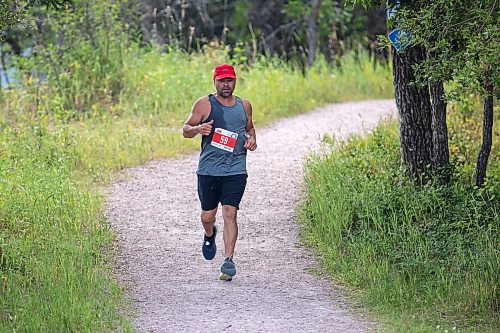 BROOK JONES / FREE PRESS
Jonathan Courchene, who is a First Nations triathlete, competes in the run portion of the Free Spirit Sprint Triathlon in Pinawa, Man., Sunday, Aug. 11, 2024.