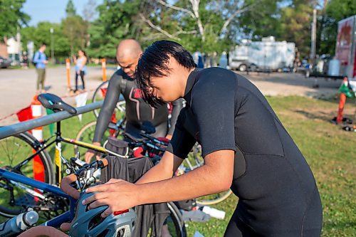 BROOK JONES / FREE PRESS
Seventeen-year-old Brad Courchene (right), who is from Sagkeeng First Nation, and Jonathan Courchene (back), who is First Nations triathlete, are pictured in the transition zone before they compete in the Free Spirit Sprint Triathlon in Pinawa, Man., Sunday, Aug. 11, 2024. Courchene has been coaching Brad in the sport of triathlon.