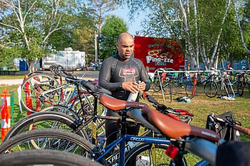 BROOK JONES / FREE PRESS
Jonathan Courchene who is First Nations triathlete is pictured holding a water bottle as he stands in the transition zone before the start of the Free Spirit Sprint Triathlon in Pinawa, Man., Sunday, Aug. 11, 2024.