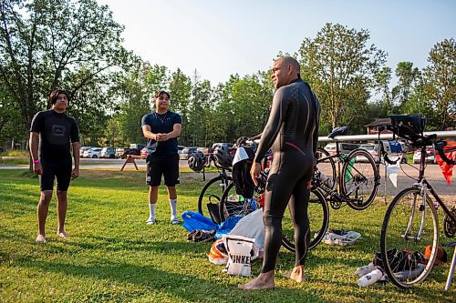 BROOK JONES / FREE PRESS
Jonathan Courchene (right), who is First Nations triathlete, is pictured in the transition zone with 15-year-old Phoenix Abraham (left) and 17-year-old Brad Courchene (middle) before they compete in the Free Spirit Sprint Triathlon in Pinawa, Man., Sunday, Aug. 11, 2024. Courchene has been coaching both youth in the sport of triathlon.