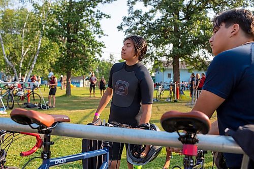 BROOK JONES / FREE PRESS
Seventeen-year-old Brad Courchene and 15-year-old Phoenix Abraham who are both from Sagkeeng First Nation are pictured in the transition zone before competing in theFree Spirit Sprint Triathlon in Pinawa, Man., Sunday, Aug. 11, 2024.