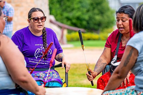 NIC ADAM / FREE PRESS
Music was sung before and after the Tina Fontaine memorial event at the MMIWG2S+ Monument at the Forks Friday.
240816 - Friday, August 16, 2024.

Reporter: Malak