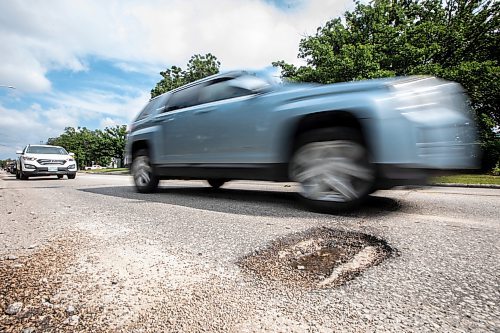 MIKAELA MACKENZIE / WINNIPEG FREE PRESS
	
A pothole at River Road and Riel Avenue on Friday, Aug. 16, 2024. 

For Joyanne story.
Winnipeg Free Press 2024