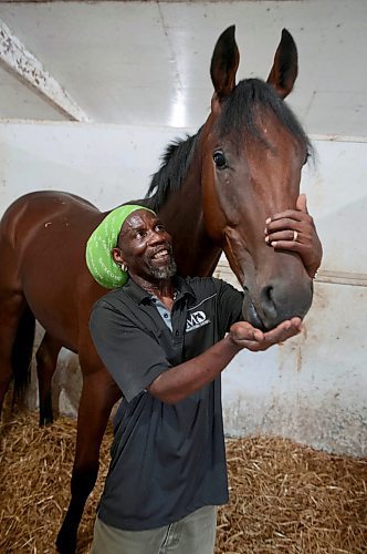 Ruth Bonneville / Free Press

Sports - Assiniboia Downs

Groomer, Clairmonte Parris, with Mr. Splash (horse), the recent CTHS Stakes winner in the stables at the  Assiniboia Downs backstretch.

See story by George Williams

 Aug 15th, 2024
