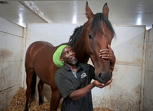 Ruth Bonneville / Free Press

Sports - Assiniboia Downs

Groomer, Clairmonte Parris, with Mr. Splash (horse), the recent CTHS Stakes winner in the stables at the  Assiniboia Downs backstretch.

See story by George Williams

 Aug 15th, 2024
