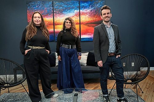 Ruth Bonneville / Free Press

BIZ - Narratives Inc.

Business portrait of Somia Sadiq (centre), Conor Smith and Desir&#xe9;e Th&#xe9;riault (left), the three partners at Narratives Inc., in their front foyer with a painting behind them created by one of their employees. 

Subject: This is for my Aug. 23 'Made in Manitoba' article. Narratives is a mix of impact assessment, conflict transformation, territorial planning and research.  The office space is multi-dimentional as it incorporates the century old building into a loft style office space. 

See story by Aaron

 Aug 15th, 2024
