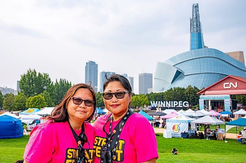 NIC ADAM / FREE PRESS
Streat Feast organizers and first-cousins Lyn (left) and Lou Alarkon pictured at Winnipeg&#x2019;s Streat Feast Festival at the Forks Friday afternoon. 
240816 - Friday, August 16, 2024.

Reporter: ?