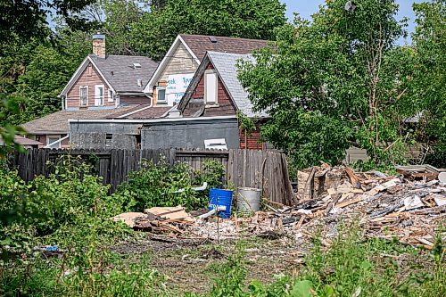 Mike Sudoma/Free Press
The remains of a vacant house in the 600 block of Stella avenue stand to the right of two neighbouring houses Saturday
August 17, 2024
