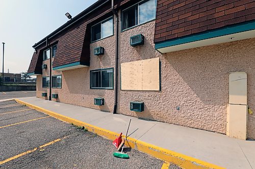 A window for one of the rooms at Brandon's Colonial Inn was covered with a sheet of plywood on Sunday. A staff member said it was where a reported fire had taken place the day before. (Colin Slark/The Brandon Sun)