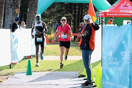 Malcolm Harvey of Kenora (133) smiles as Taylor McVannel of MacGregor (115) sprints past him near the finish line during the Riding Mountain Triathlon's Dri-Tri on Saturday morning at Wasagaming. (Perry Bergson/The Brandon Sun)
Aug. 19, 2024
