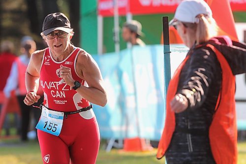 Shannon Sawatzky of Steinbach (155) is guided by a volunteer to the finish line during the Riding Mountain Triathlon's Dri-Tri on Saturday morning at Wasagaming. (Perry Bergson/The Brandon Sun)
Aug. 19, 2024