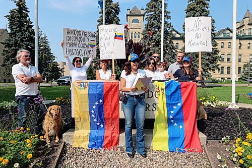 Venezuelan immigrants living in Brandon and their families gathered in front of Brandon University's Clark Hall on Saturday morning to protest the refusal of President Nicolas Maduro to concede last month's presidential elections. (Colin Slark/The Brandon Sun)