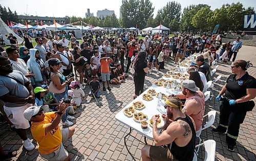 JOHN WOODS / WINNIPEG FREE PRESS
People compete by eating 30 tacos at the Birria Battle Eating Competion during Streat Feast at the Forks in Winnipeg Sunday, August 18, 2024.

Re: ?