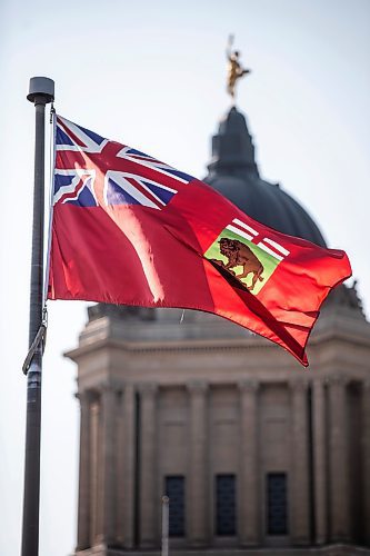 MIKAELA MACKENZIE / WINNIPEG FREE PRESS
	
The Manitoba flag flies in front of the Manitoba Legislative Building on Monday, Aug. 19, 2024. According to a Probe Research poll, 49% of Manitobans would support creating a new flag for the province.

Winnipeg Free Press 2024