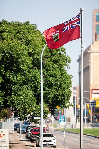 MIKAELA MACKENZIE / WINNIPEG FREE PRESS
	
The Manitoba flag flies in front of the Manitoba Legislative Building on Monday, Aug. 19, 2024. According to a Probe Research poll, 49% of Manitobans would support creating a new flag for the province.

Winnipeg Free Press 2024