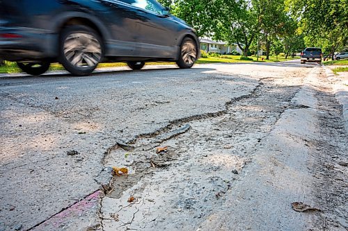 NIC ADAM / FREE PRESS
After a long wait, pothole repairs finally commence along Augusta Dr. Monday.
240819 - Monday, August 19, 2024.

Reporter:?