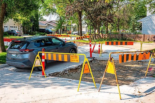 NIC ADAM / FREE PRESS
After a long wait, pothole repairs finally commence along Greensboro Bay Monday.
240819 - Monday, August 19, 2024.

Reporter:?