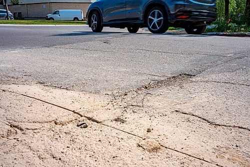 NIC ADAM / FREE PRESS
After a long wait, pothole repairs finally commence along Augusta Dr. Monday.
240819 - Monday, August 19, 2024.

Reporter:?