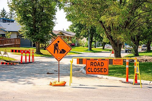 NIC ADAM / FREE PRESS
After a long wait, pothole repairs finally commence along Augusta Dr. Monday.
240819 - Monday, August 19, 2024.

Reporter:?