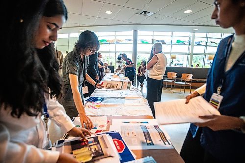 MIKAELA MACKENZIE / WINNIPEG FREE PRESS
	
People gather items to place into a time capsule remembering the COVID-19 pandemic and the healthcare workers that held steadfast during that time at the St. Boniface Hospital on Tuesday, Aug. 20, 2024.

Winnipeg Free Press 2024