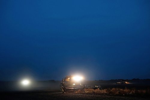 20082024
Combines work to harvest peas in a field southwest of Rivers at dusk on Monday evening.
(Tim Smith/The Brandon Sun)