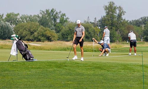 MIKE DEAL / FREE PRESS
Players take to the practice green Tuesday morning to get ready for the CentrePort Canada Rail Park Manitoba Open which will be starting on August 22 at Southwood Golf and Country Club.
See Mike McIntyre story
240820 - Tuesday, August 20, 2024.