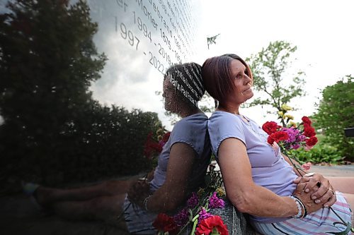 Ruth Bonneville /Free Press

Local - MADD Memorial photo
 
Photo of  Krista Brown holding a red flower next to the name of her partner, Martin Paul Robak, on the monument. Her partner&#x573; name was added on the weekend.

The MADD Manitoba Memorial Monument is located at Glen Eden Funeral Home and Cemetary 4477 Main Street West St. Paul.

Who: Krista Brown, partner of Martin Paul Robak who was killed by a drunk driver. 

Reporter: Jura

Aug 20, 2024