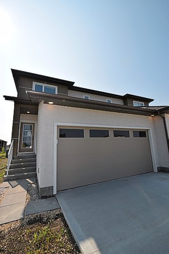 Photos by Todd Lewys / Winnipeg Free Press
This two-storey attached home is a value-packed design that is due to be followed up by a series of attached two-storeys just a stone's throw away.