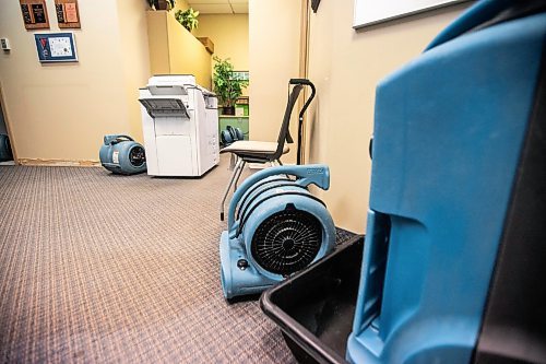 MIKAELA MACKENZIE / WINNIPEG FREE PRESS
	
The Meals on Wheels office, which has industrial fans and dehumidifiers drying it out, after a flood damaged the Holiday Towers building in downtown Winnipeg on Wednesday, Aug. 21, 2024.

For Nicole story.
Winnipeg Free Press 2024