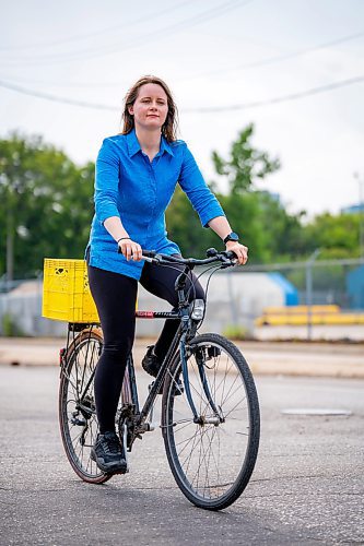 NIC ADAM / FREE PRESS
Hillary Rosentreter, pictured at the corner of Annabella St. and Sutherland Ave. Wednesday, is calling for the province to change the Highway Traffic Act to allow those on bikes to do an &#x201c;Idaho stop,&#x201d; basically treating stop signs as yields where they can proceed through as safe without coming to a full stop. 
240821 - Wednesday, August 21, 2024.

Reporter: Joyanne