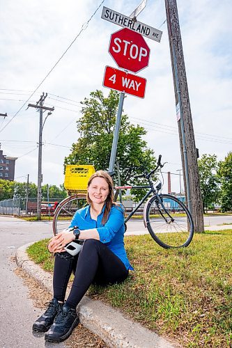 NIC ADAM / FREE PRESS
Hillary Rosentreter, pictured at the corner of Annabella St. and Sutherland Ave. Wednesday, is calling for the province to change the Highway Traffic Act to allow those on bikes to do an &#x201c;Idaho stop,&#x201d; basically treating stop signs as yields where they can proceed through as safe without coming to a full stop. 
240821 - Wednesday, August 21, 2024.

Reporter: Joyanne