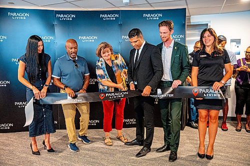 NIC ADAM / FREE PRESS
Deputy Mayor Janice Lukes (centre left) cuts the ribbon for the opening of The Bridgewater, Wednesday.
240821 - Wednesday, August 21, 2024.

Reporter: Gabby Piche