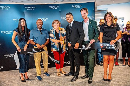 NIC ADAM / FREE PRESS
Deputy Mayor Janice Lukes (centre left) cuts the ribbon for the opening of The Bridgewater, Wednesday.
240821 - Wednesday, August 21, 2024.

Reporter: Gabby Piche