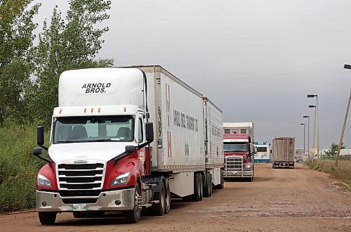 Trucks make their way out of Maple Leaf Foods Brandon located at 6355 Richmond Ave East on Thursday. (Abiola Odutola/The Brandon Sun)