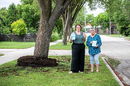 MIKAELA MACKENZIE / WINNIPEG FREE PRESS
	
Paige Johal (left) and Joyce Maryk, who were forced to remove tree decorations and a garden box on the boulevard after recieving notices from the city, in their Transcona neighbourhood on Thursday, Aug. 22, 2024.

For Nicole story.
Winnipeg Free Press 2024