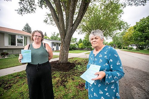 MIKAELA MACKENZIE / WINNIPEG FREE PRESS
	
Paige Johal (left) and Joyce Maryk, who were forced to remove tree decorations and a garden box on the boulevard after recieving notices from the city, in their Transcona neighbourhood on Thursday, Aug. 22, 2024.

For Nicole story.
Winnipeg Free Press 2024