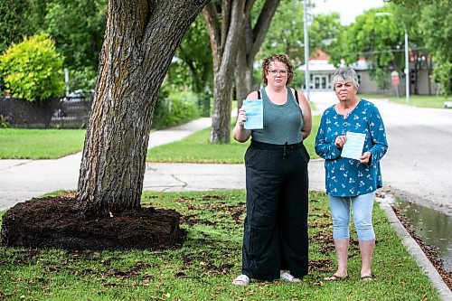 MIKAELA MACKENZIE / WINNIPEG FREE PRESS
	
Paige Johal (left) and Joyce Maryk, who were forced to remove tree decorations and a garden box on the boulevard after recieving notices from the city, in their Transcona neighbourhood on Thursday, Aug. 22, 2024.

For Nicole story.
Winnipeg Free Press 2024