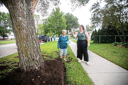 MIKAELA MACKENZIE / WINNIPEG FREE PRESS
	
Joyce Maryk (left) and Paige Johal, who were forced to remove tree decorations and a garden box on the boulevard after recieving notices from the city, in their Transcona neighbourhood on Thursday, Aug. 22, 2024.

For Nicole story.
Winnipeg Free Press 2024