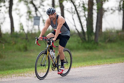 BROOK JONES / FREE PRESS
Jonathan Courchene, who is a First Nations triathlete, competes in the bike portion of the Free Spirit Sprint Triathlon in Pinawa, Man., Sunday, Aug. 11, 2024.