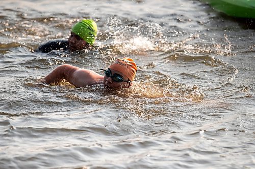 BROOK JONES / FREE PRESS
Fifteen-year-old Phoenix Abraham (right) and 17-year-old Brad Courchene (left), who are both from Sagkeeng First Nation, compete in the swim portion of the Free Spirit Sprint Triathlon in Pinawa, Man., Sunday, Aug. 11, 2024.