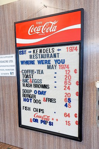 MIKE DEAL / FREE PRESS
On the wall by the cash register is a menu board that has the original 1974 menu with prices on it.
Jeff Kendel is celebrating the 50th anniversary of Kendel's Diner and gas station at 1157 McLeod Avenue which he and his father opened in 1974 when they bought the one bay service station that happened to include a small restaurant.
See Matt Frank story
240821 - Wednesday, August 21, 2024.